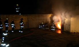 IFCO members put out shed fire during handline drill. (1/23/10)
